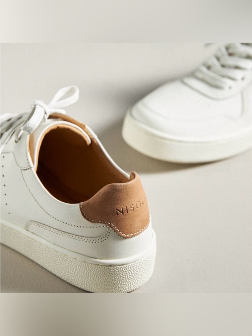 Anthropologie Nisolo White Leather Sneakers with Tan Heel Accent